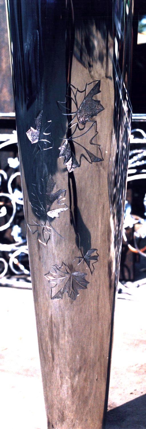 Kaleidoscope-Engraved column of a bar